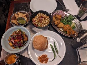 Vegan options !! Soy kebab w pineapple in top corner at Dishoom - King's Cross in London