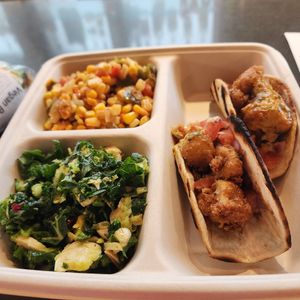 Taco plate with corn side and kale and brussels salad at DTW - Plum Market in Romulus
