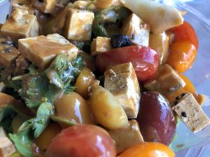 Cold uncooked tofu, drenched in Thai peanut sauce at Spoondrift in Sanibel