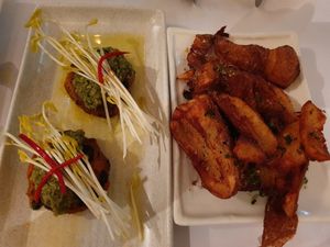 smoky black bean & sweet potato cakes. along with chat potatoes at Rubyos in Newtown