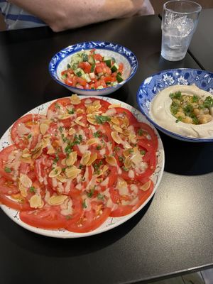 Tomato and small salad and classic hummus from special  at Hummus Chiang Mai in Chiang Mai