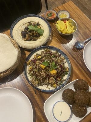 Falafels, iron salad (quinoa, mango and lentils), mushroom hummus w pita. Complimentary pickled veggies (too spicy for us!)  at Hummus Chiang Mai in Chiang Mai