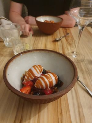 Strawberry and Thai basil sorbet on fresh berries at Hügge in Turku