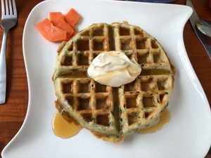 Chaya (spinach) Belgian Waffle with jalapeño syrup and cashew crema  at Origin  in San Pedro