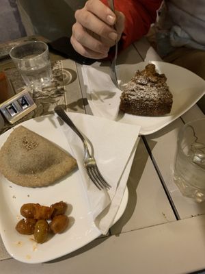 Calzone vegano e torta di carote  at Naama Cafè in Bologna