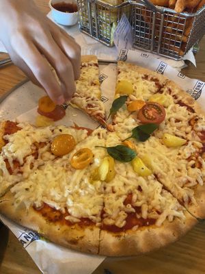 Margherita pizza with vegan cheese.  at Sandstone Point Hotel in Sandstone Point