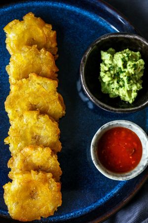 Caribbean Chips made from Plantain Bananas served with homemade guacamole and chili salsa. at Two Monkeys in Copenhagen