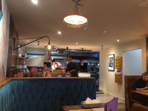 Open kitchen with pizza oven at Four London Road in Waterlooville