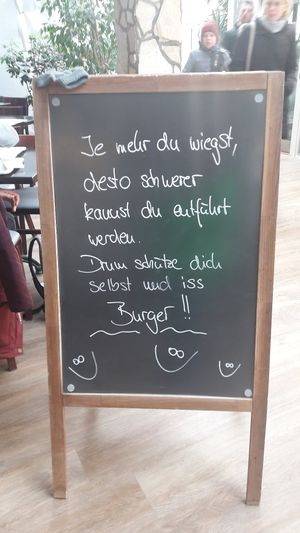 Schild mit Joke 🤡 at Bistro in der Dünengalerie in Wangels