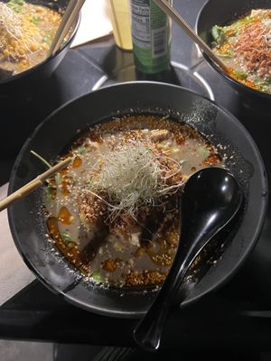 Yuzu Sesame Ramen- “Sesame taste light spicy-soboro (vegan meat and tofu), corn, onion, arugula and chilli oil.” Delicious!!!! It was so flavorful😄 at REDWHITE BONELESS RAMEN - Boston in Boston