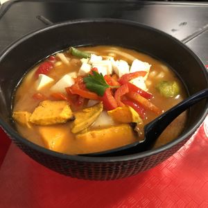 Forbidden Spicy miso broth with udon, veggies, chickpeas, plus my added on tofu and yams.  So good! at REDWHITE BONELESS RAMEN - Boston in Boston