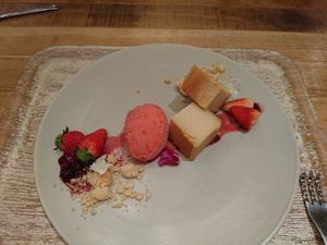 Super good vegan cheesecake with strawberry sorbet! at Pique Cafe in Tokyo