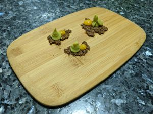 First taste - bean crackers with mango gel and smoked guacamole at The Culinary Alchemists in Nuevo Arenal