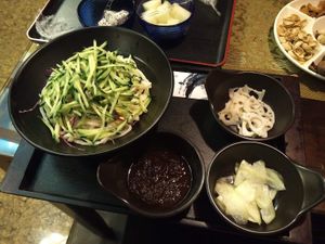 Udon noodles and cucumber with hoisin sauce at Luyuxuan Teahouse in Beijing