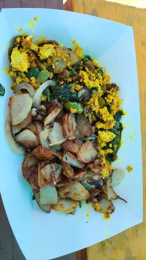 Tofu scramble with peppers and spinach and side of hash browns at Freshfit Cafe in Nags Head
