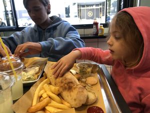 The kids munching on the vegan fast food at The Green Butcher in Tel Aviv