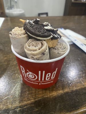 oatmilk base with oreos mixed in topped with peanut butter and oreo  at Rolled Mountain Creamery - Riverside Dr in Reno