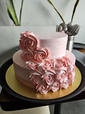 Vanilla cake with frosting at Loving Hut - Vegan Paradise in Gurgaon