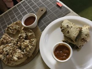 mushroom chili wrap & pizza  at Loving Hut - Vegan Paradise in Gurgaon