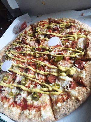New vegan hotdog pizza with ketchup and mustard  at Papa John's in Rochester