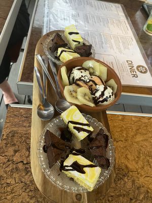 Dessert board for two, plenty for the four of us! Brownies, cheesecake, vanilla ice cream, sorbet ice cream and kiwifruit.  at Bistro Calypso in Eindhoven