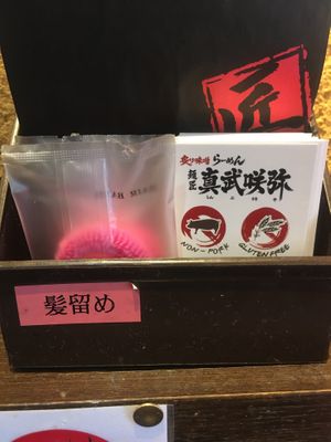 There are Hair clip. at Shinbu Sakiya Ramen - 麺匠真武咲弥 in Tokyo