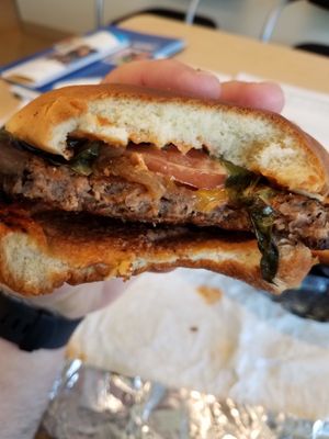 burger--bite shot at Can't Believe It's Not Meat - Hyde Park in Chicago