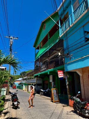 How to find us on main street - the big green building at ReThink in Utila