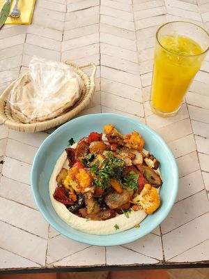 Hummus and veg plate plus ginger tonic (oj ginger and mint) at Naranj in Marrakech