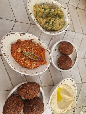 I had the mezze sharing starter for 2 as a main. 8 flat breads came with it. Very tasty, hummus was very smooth! at Naranj in Marrakech