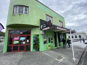 Outside, next to the river. Close to train station  at DP1 Cafe in Greymouth