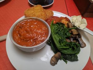 Vegan brunch with beans hash browns tomatos mushrooms and vegan cream cheese at DP1 Cafe in Greymouth