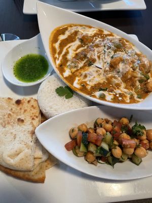 Vegetable korma with coconut milk   at Cilantro Indian Cafe in Cary