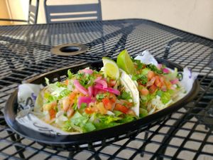 Plant Fare and Vegan Steak Tacos garnished with vegan cheese and veggies. Truly Delicious! at Taco Bus in Orlando