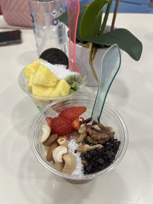 One is choc ice cream, one is vanilla. Both with vegan toppings   at Frozen FruYo in Rhodes