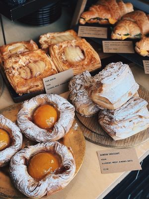 Selection of peach danish, pear danish, almond croissants and savoury filled croissants   at The BRIGHT Store in East London