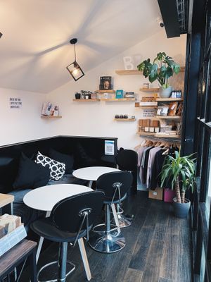 Sit in the upstairs coffee shop at The BRIGHT Store in East London