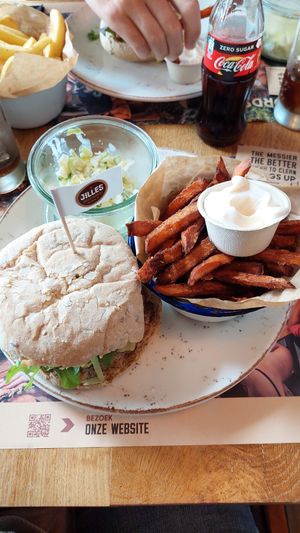 Dimitri burger and sweet potato fries with vegan mayo and coleslaw salad. at Jilles in Oostende