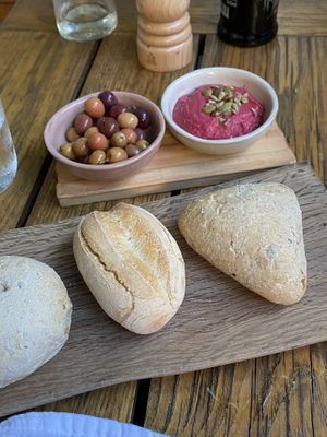 Bread with olives and humus  at RE Organic in Mallorca