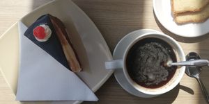 My decaf with the cherry berry cake at Coffee Cake Bakery in Podgorica