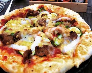 The Vegan Pizza here is the best I've ever had. at Queen's Healthy Diner in Nagoya