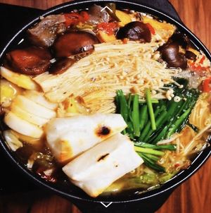 Need Reservation.  Spicy hot pot / Topped off with Ramen noodles. 2500 yen per person, from 2 person is available.  at Queen's Healthy Diner in Nagoya