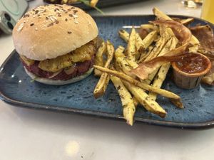 Burger with pineapple, fries, & sweet potato  at Pim Pam Pum in Portimao