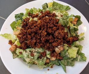 Caesar salad at Secret Pizza Society in Portland