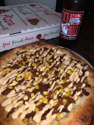 Custom pizza! With corn 😋 at Secret Pizza Society in Portland