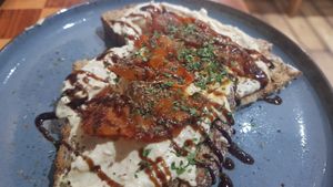 Balsamic and garlic roasted tomatoes on bed of hummus sourdough #Veganuary at Sea Change  in South Shields