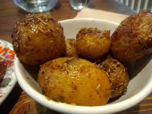 Roasted potatoes at Wholywood in Paris