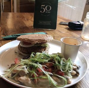 Vegan burger and salad with sweet chilli sauce  at 50Nine in St Albans