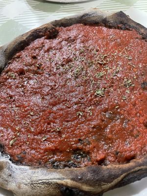 Marinara Pizza with carbon (charcoal) infused base  at Marrobbio in Sliema