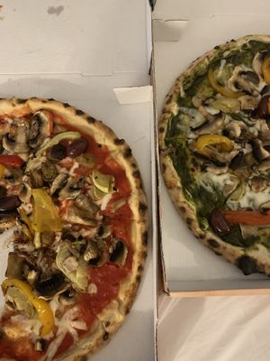 The ‘Veg’ pizza - one with basil pesto, one with a tomato base  at Marrobbio in Sliema